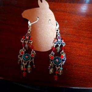 These are one of a kind handmade earrings.